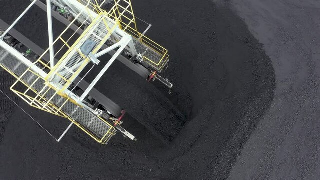 Coal terminal with technics working in it.