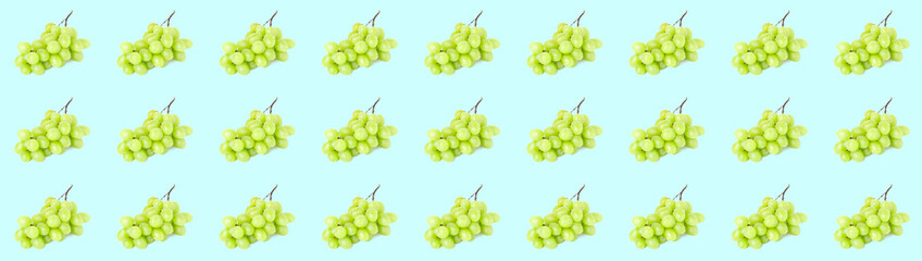 Many ripe grapes on color background. Pattern for design