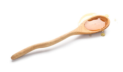 Wooden spoon with tasty maple syrup on white background