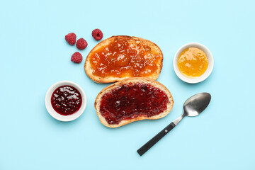 Composition with toasts and bowls of jams on color background