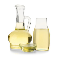 Glass decanter, bottle and bowl with sunflower oil on white background