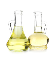 Decanters of sunflower oil on white background