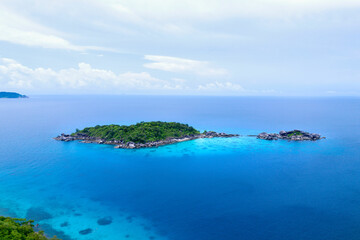 Fototapeta premium aerial view of the Similan Islands, the Andaman Sea, with natural blue waters, tropical seas, impressive views of the island's beauty. The island is shaped like a heart.