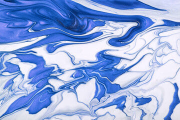 Abstract fluid art background navy blue and white colors. Liquid marble. Acrylic painting with...