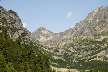 Hot summer day. Mountain landscape with the huge rocky slopes of the High Tatras, Slovakia