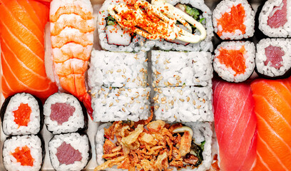 Sushi Pattern. Sushi set with rice, salmon  and shrimps top view. Japan restaurant menu..
