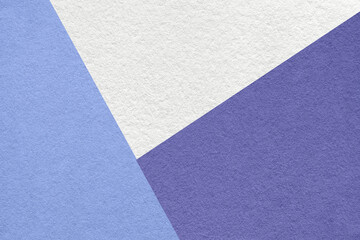 Texture of craft white, blue and violet shade color paper background, macro. Abstract very peri cardboard