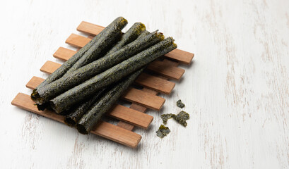 Deep fried seaweed rolls,Snacks, Seaweed, Baked, Dried, Crispy on wood table