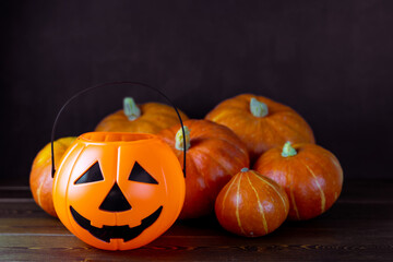 Halloween pumpkins on wooden background