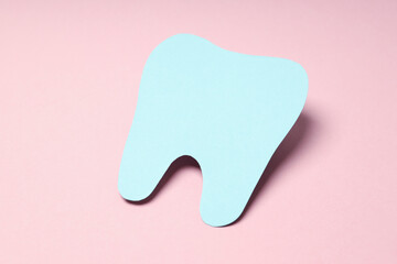 Concept of dental care on pink background