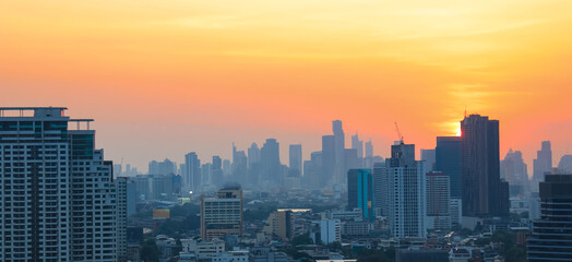 The sunset sky scene in a cityscape town ,Bangkok ,Thailand