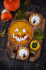 Halloween pumpkin pie in shape of jack-o-lantern