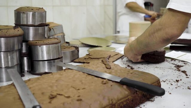 Baked cakes waiting to be cut in the workshop