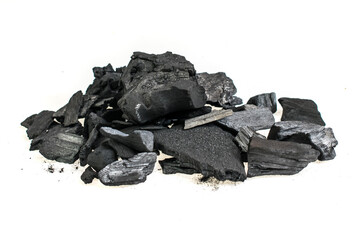 pieces of charcoal on a white isolated background
