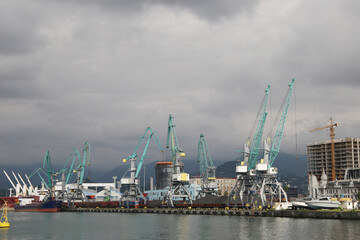 cargo cranes in the water area of the port of Batumi