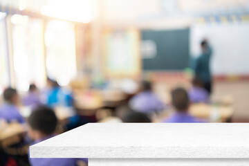 Cropped shot of white table, stationery and copy space in blurred study room