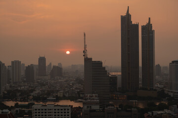 Fototapeta na wymiar Tall skyscrapers feature urban architecture and modern Bangkok skylines.bangkok city landscape sunset scenery.