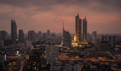 Tall skyscrapers feature urban architecture and modern Bangkok skylines.bangkok city landscape sunset scenery.