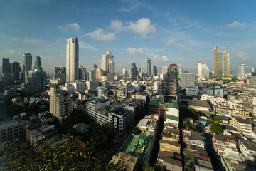 Obraz premium Tall skyscrapers feature urban architecture and modern Bangkok skylines.bangkok city landscape sunset scenery.
