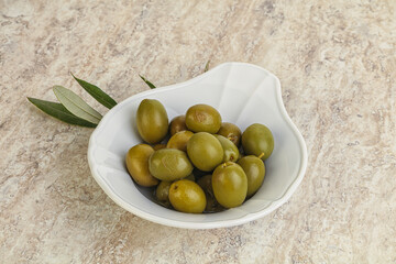 Tasty marinated olives in the bowl