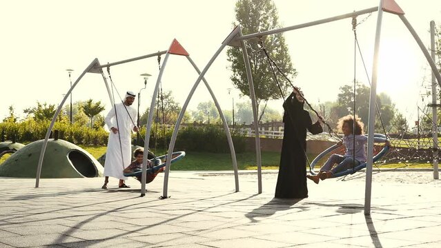 cinematic and storytelling clip video of a family from the emirates spending time at the park in Dubai
