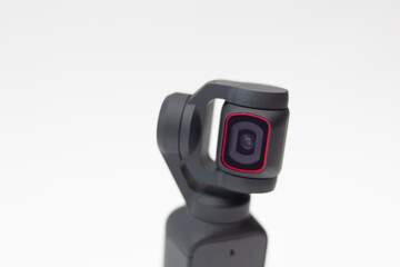 Action Camera video gimbal stabilizator on white background.