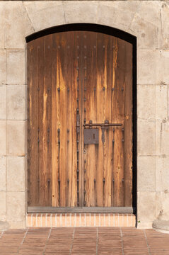 Old wooden door of the castle, it is very big