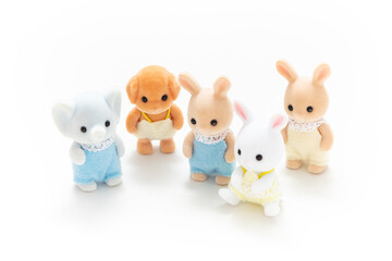 Animal doll isolated on white background. Miniature dollhouse toy. Kids toy. Animal character. Play and learn. Kids room. Childhood. Kindergarten toy. Developmental toys.
