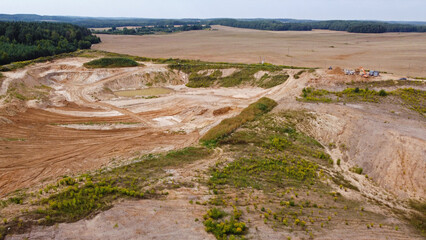 Aerial view of agro rural fields. Harvesting on the farm landscape