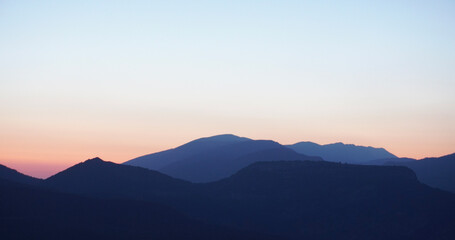 Naklejka na ściany i meble sunset over the mountains