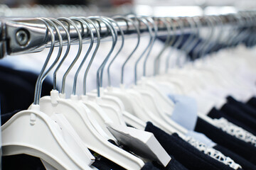 Fototapeta premium School clothes hanging in the mall on hangers