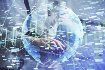 Multi exposure of woman hands typing on computer and business theme hologram drawing. Success concept.