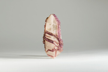 A sample of a natural mineral Fluorite (halides clas) growth of small crystals on quartz,...