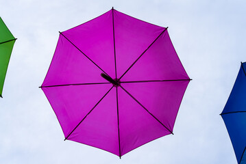 UMBRELLA - Colorful objects on the background of the clouds sky  © Wojciech Wrzesień