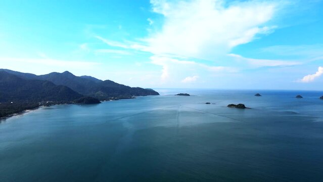 Flying a drone to take pictures of the sea and mountains on Koh Chang, quiet and peaceful.