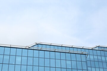 Modern building against blue sky. Urban architecture