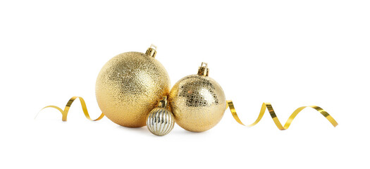 Beautiful shiny golden Christmas balls on white background