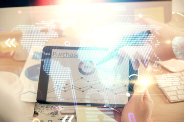 Multi exposure of man's hands holding and using a digital device and map drawing. International business concept.