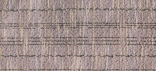 The texture of uneven natural cotton brown fabric, abstract background.panoramic view