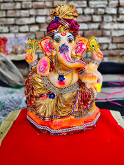 Jaipur, India Circa 2022: Picture of sculpture of Lord Ganesha. Outdoors daylight. Ganesh Chaturthi. Festival celebration
