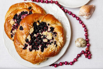 Traditional buns with blueberry filling.