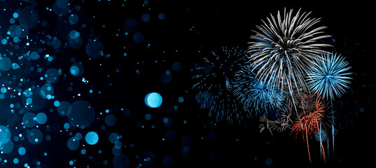 Red and Blue Firework in bokeh defocus glitter blur background.