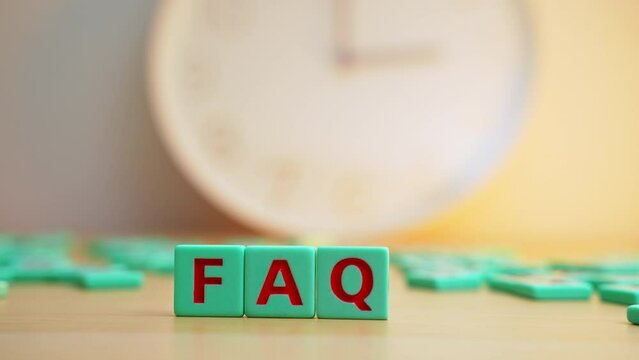 The FAQ made of small colorful cube letters. . High quality 4k footage
