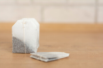 Single tea bag and bags next to it in the background