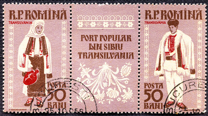 ROMANIA - CIRCA 1958 : Cancelled postage stamp printed by Romania, that shows National costume from...