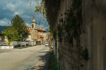 Small old street in the south of Italy. Shabby stone houses