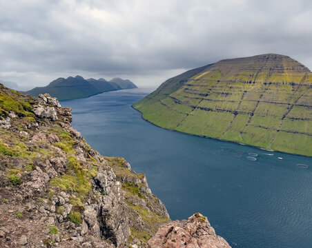View of the rugged northern Faroese islands from the top of the klakkur mountain near Klaksvík, the second largest town of the Faroes behind Tórshavn, located on Borðoy Island, Norðoyar, Faroe Islands