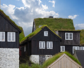 Tinganes, the historical core of Torshavn, the capital of the Faroe Islands (Faroes, Faeroes, Føroya, Færøerne, a North Atlantic archipelago part of the Kingdom of Denmark. - obrazy, fototapety, plakaty