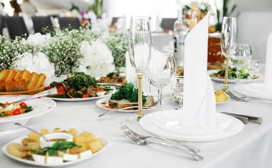 Serving the banquet table. Glass, plate, and utensils.