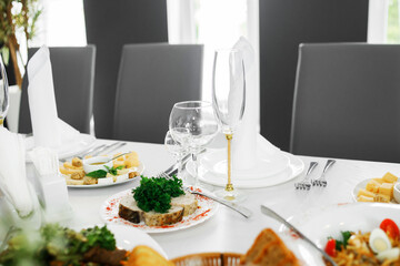 Serving the banquet table. Glass, plate, and utensils.